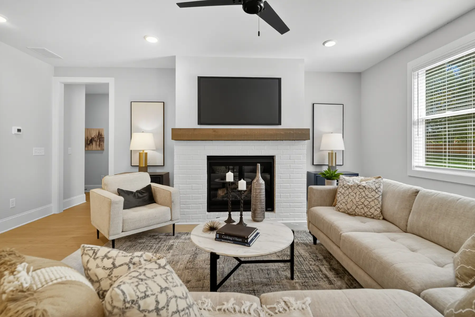 Warm staged living room photographed by Archetype Visuals